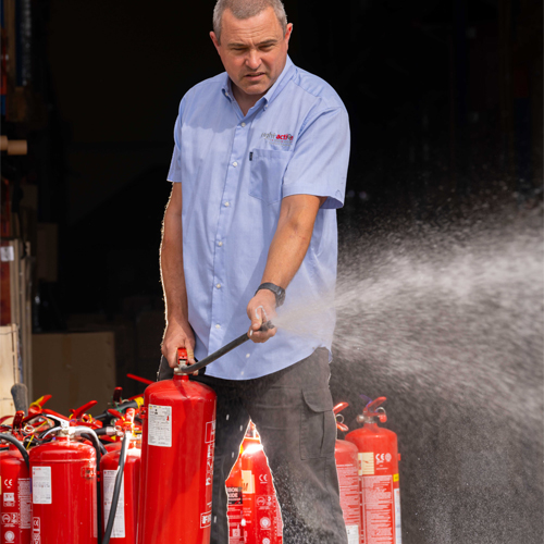 Fire extinguisher discharging