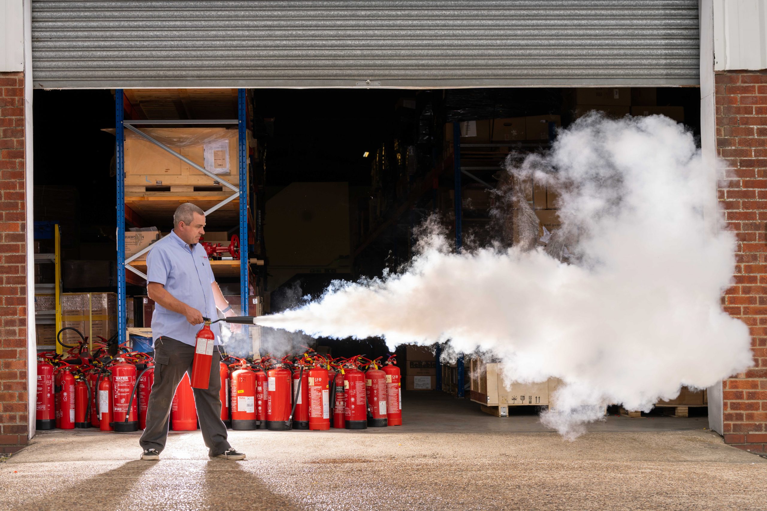 person extinguishing fire